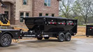 Roll-Off Dumper Trailer with a full load at a construction site