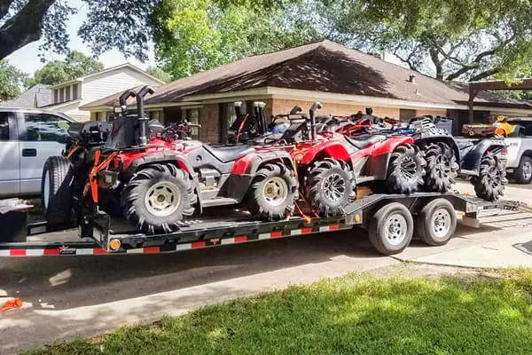 The 8" Channel Super-Wide Trailer (B8) holding three ATVs