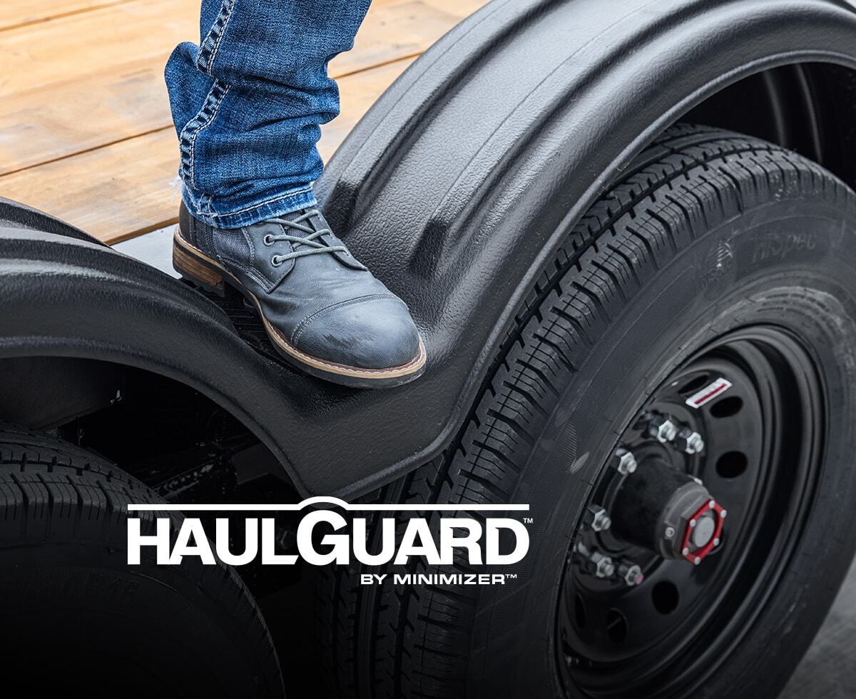 haul guard logo with boot stepping background